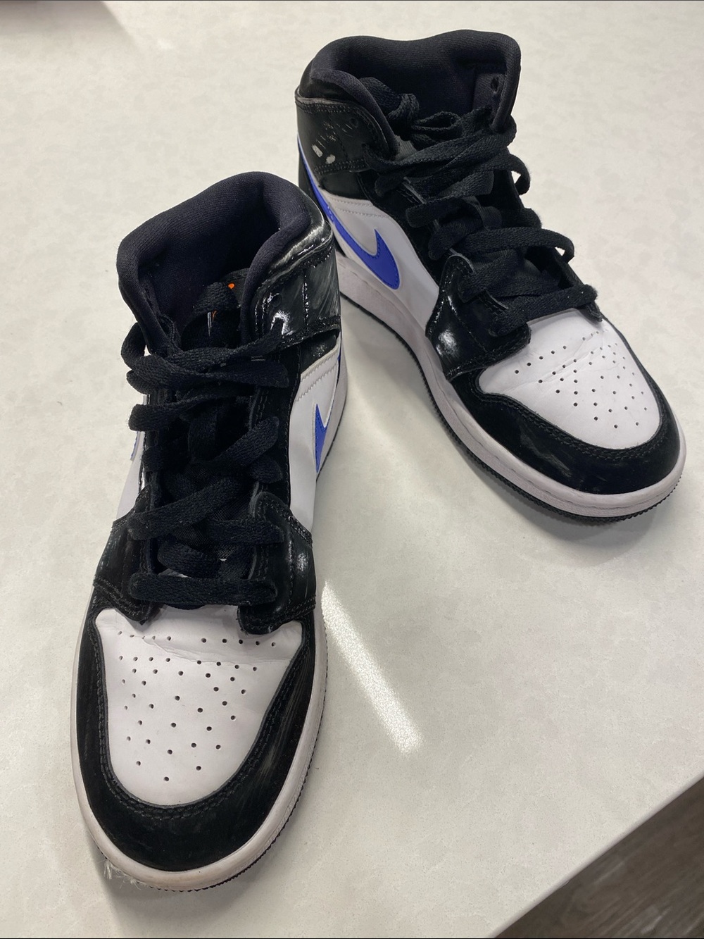 Nike Air Jordan 1 mid black / racer blue Sneakers